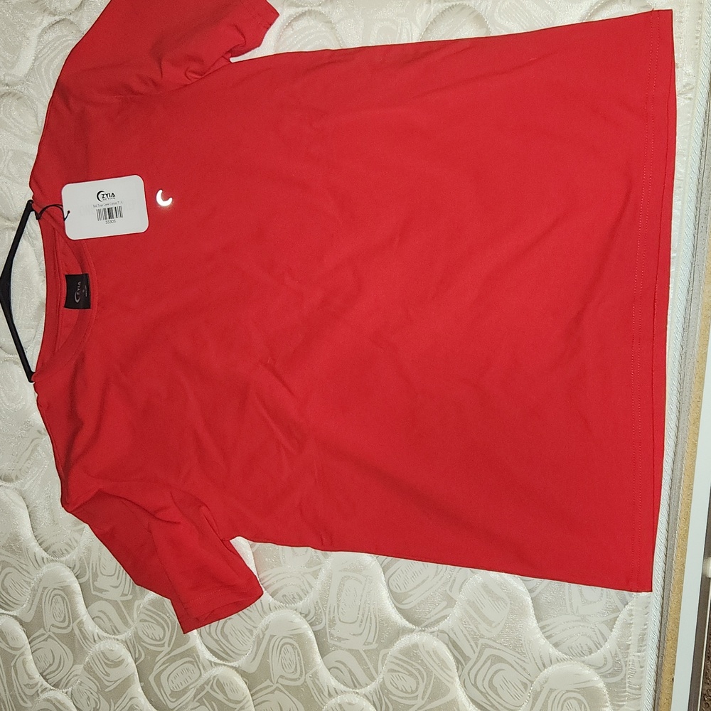 Zyia shirt, size small, red, and new with tags. It is oversized